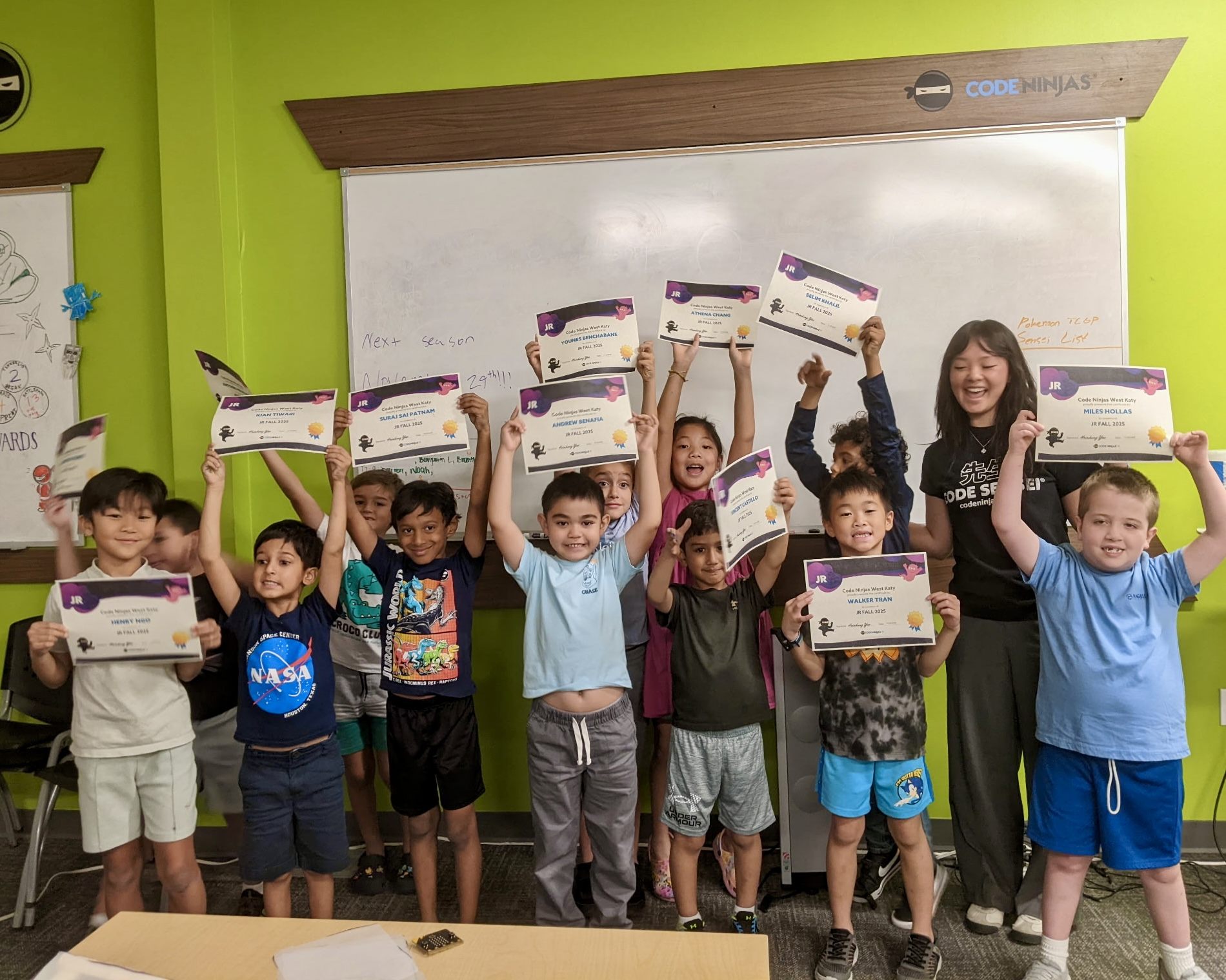 code ninjas students holding certificates